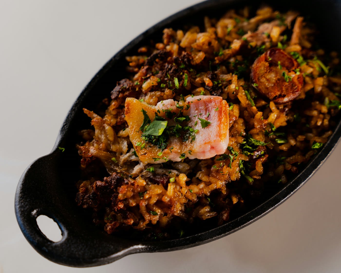 Duck rice, the oven-baked arroz de pato with crisped rice and chourico